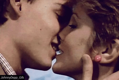 Man And Woman Kissing GIF