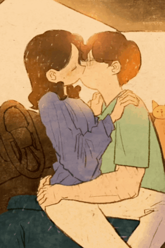 Man And Woman Kissing With Cat Behind GIF