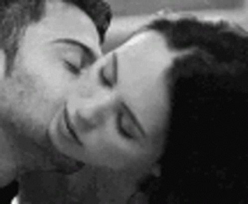 Man And Woman Kissing With Eyes Closed GIF