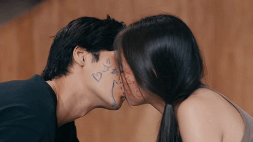 Man and Woman Kissing with Heart Face