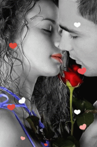 Man And Woman Kissing With Hearts GIF
