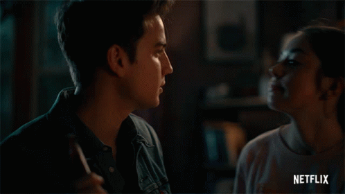 Man And Woman Kissing With Netflix Logo GIF