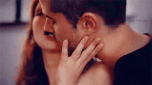 Man And Woman Kissing Woman Touching Man's Face GIF