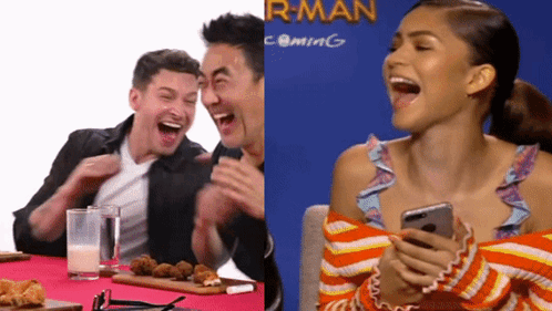 Man And Woman Laughing At R-Man Coming Sign GIF