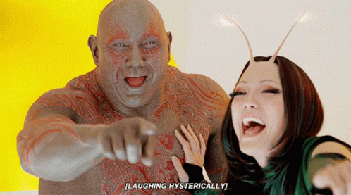 Man And Woman Laughing Hysterically Man Pointing GIF