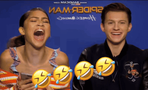 Man and Woman Laughing in Front of Blue Background Saying Mod Maxxiiab