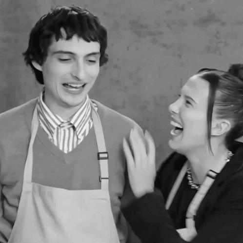 Man and Woman Laughing Together