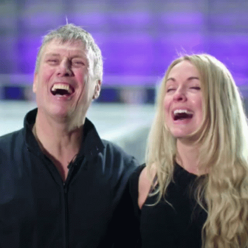 Man and Woman Laughing with Mouths Open