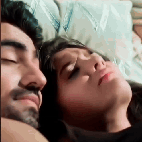 Man And Woman Laying On Bed Eyes Closed GIF