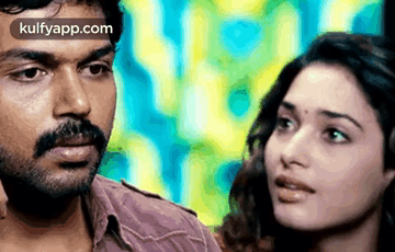 Man and Woman Looking at Each Other Colorful Background