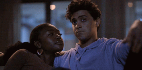 Man and Woman Looking at Each Other Eyes Closed