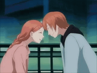 Man and Woman Looking at Each Other Eyes Closed