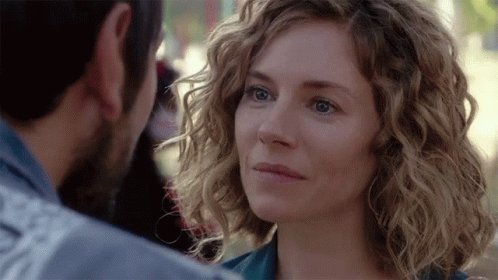 Man And Woman Looking At Each Other Eyes Closed GIF