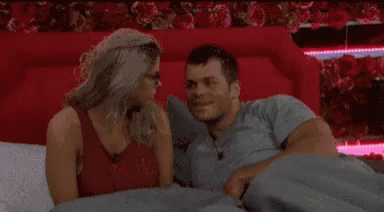 Man And Woman Looking At Each Other In Bed GIF
