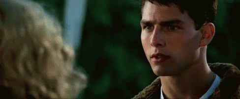 Man And Woman Looking At Each Other In Movie GIF