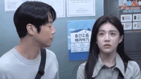 Man And Woman Looking At Each Other Saying I'm Sorry GIF