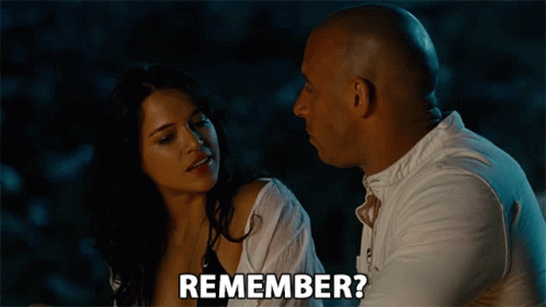 Man and Woman Looking at Each Other Saying Remember