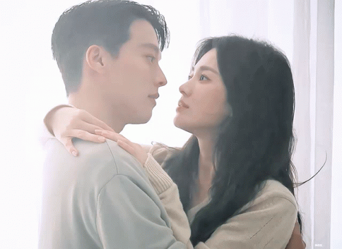 Man And Woman Looking At Each Other GIF