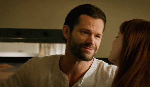 Man And Woman Looking At Each Other GIF