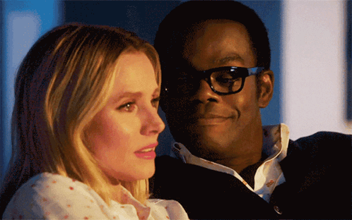 Man And Woman Looking At Each Other Woman Wearing Glasses GIF