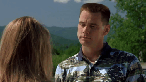 Man And Woman Looking At Mountains GIF