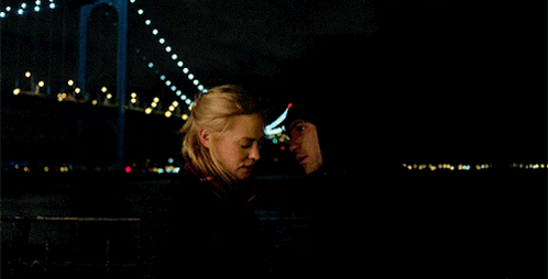 Man and Woman Looking in Darkness