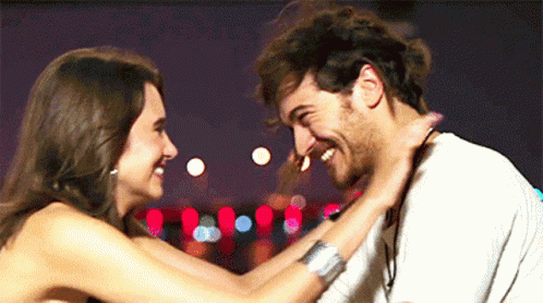 Man and Woman Looking Into Each Other's Eyes