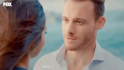 Man and Woman Looking Into Each Other's Eyes