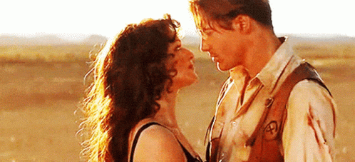 Man and Woman Looking Into Each Other's Eyes
