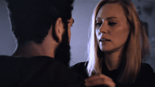 Man and Woman Looking Into Each Other's Eyes
