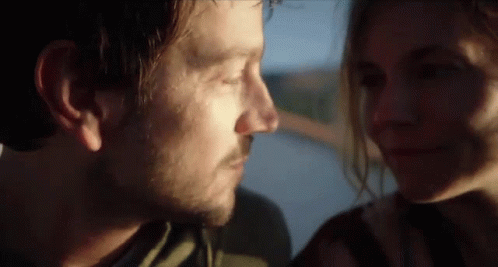 Man and Woman Looking Into Each Other's Eyes