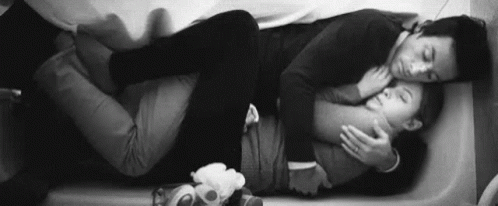 Man And Woman Lying In Bathtub GIF