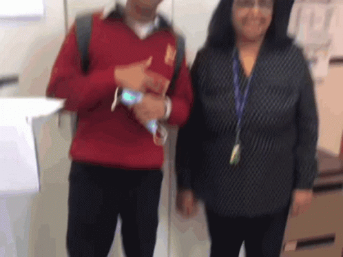 Man and Woman, Man in Red Sweater with U