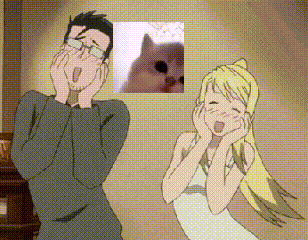 Man and Woman Next to Cat Picture
