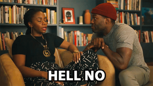 Man and Woman on Couch Saying Hell No