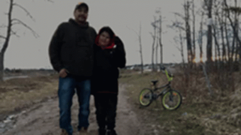 Man and Woman on Dirt Road