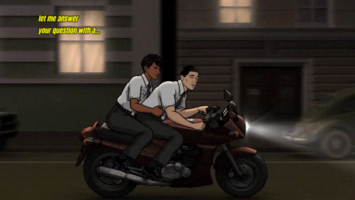 Man and Woman on Motorcycle Saying Let Me Answer Your Question