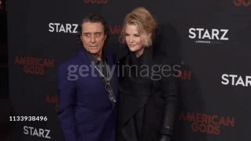 Man and Woman on Red Carpet Saying Starz