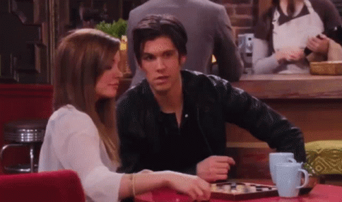 Man And Woman Playing Chess GIF