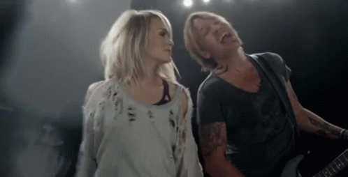 Man And Woman Playing Guitars GIF