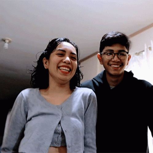 Man and Woman Posing and Smiling