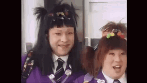 Man And Woman Posing, Woman In Wig GIF