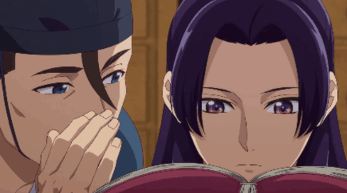 Man And Woman Reading Book Together GIF