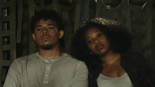 Man And Woman Resting Heads On Each Other GIF