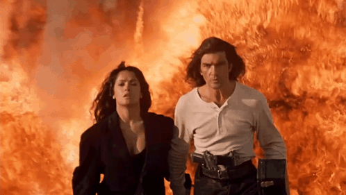 Man and Woman Running from Fire