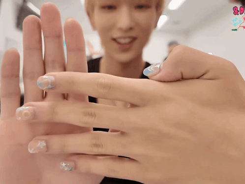 Man and Woman's Nails With Shady Af Comebacks