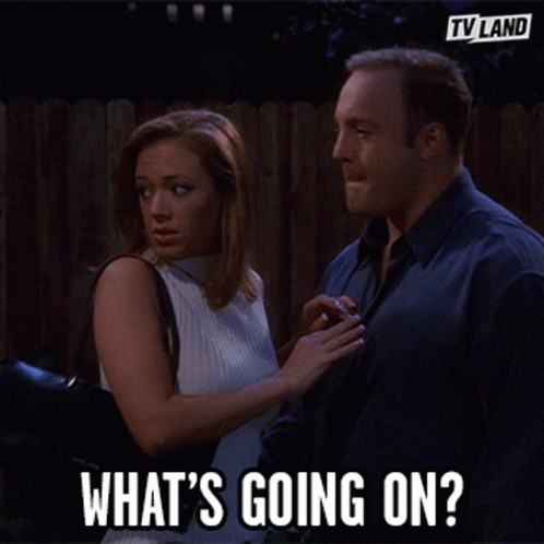 Man and Woman Saying What's Going On