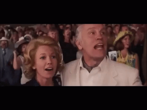 Man And Woman Screaming In Crowd GIF