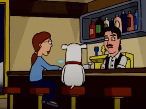 Man and Woman Sitting at Bar with Dog