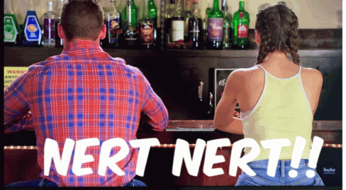 Man And Woman Sitting At Bar With Nert Nert GIF